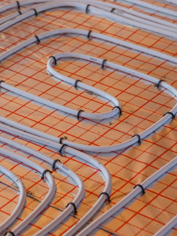 Underfloor surface heating pipes. Low temperature heating concept